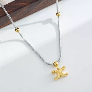 Elegant Gold and Silver Pendant Necklace